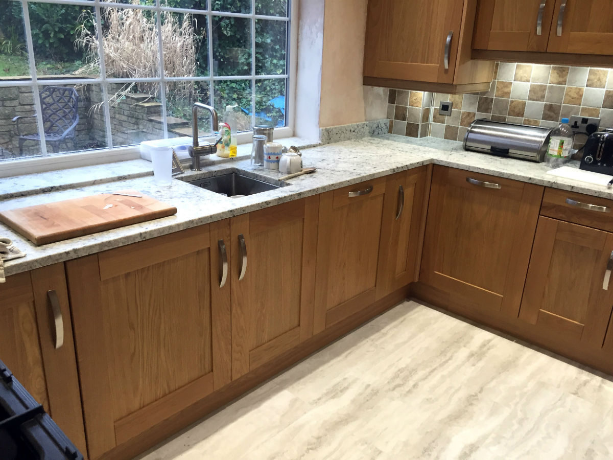 Solid oak shaker style kitchen with granite work surfaces - Blackwood ...